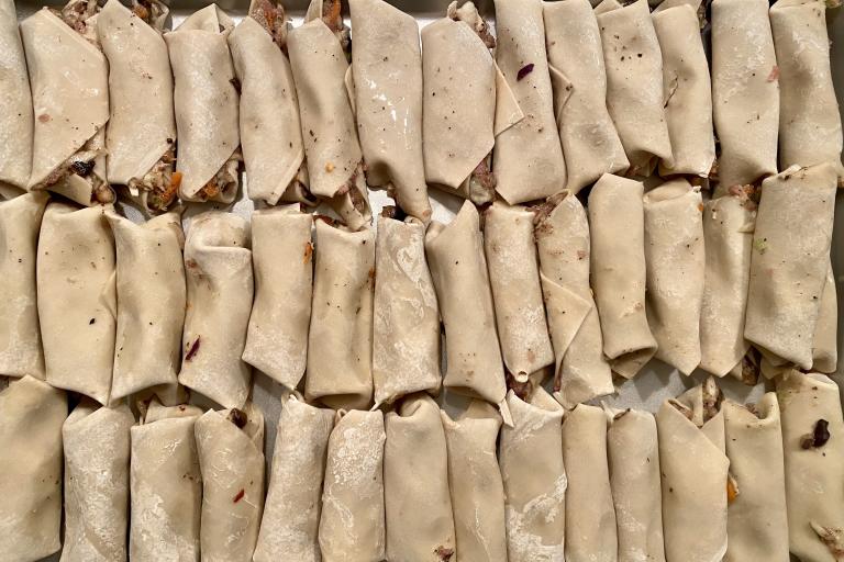 Spring rolls reolled before going into the oven